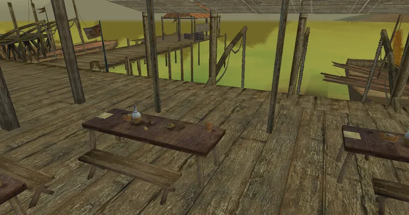 Wooden pier with tables at the Hive Ridge Landing harbor